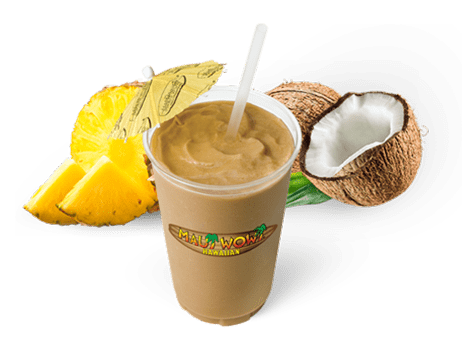 Tropical smoothie featuring a creamy blend of coconut and pineapple, garnished with a paper umbrella, ideal for refreshing summer drinks.
